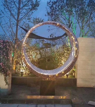地产楼盘圆环镂空透光镜面不锈钢雕塑
